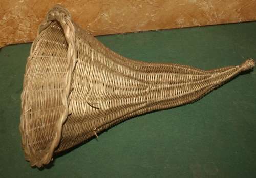 A STUNNING WICKER WEAVED FLOWER CONE - OR BEEN USED TO DISPLAY FRUIT