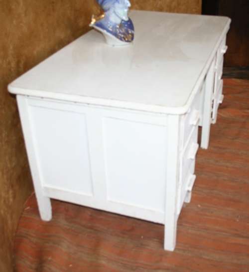 Here I have a charming shabby chic desk with 6 drawers.