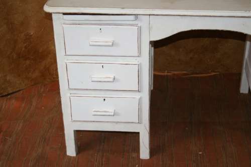 Here I have a charming shabby chic desk with 6 drawers.