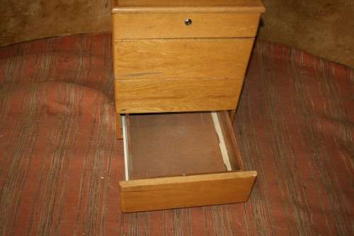 A FANTASTIC OAK FINISHED CREDENZA WITH A STATIONARY DRAWER OR PERFECT TO PUT YOUR CD COLLECTION IN