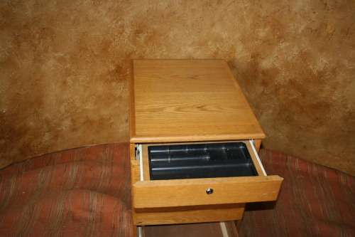 A FANTASTIC OAK FINISHED CREDENZA WITH A STATIONARY DRAWER OR PERFECT TO PUT YOUR CD COLLECTION IN