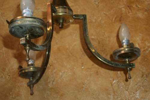 A stately three tier Vintage chandelier . The beautiful 3-light Vintage fixture is stunning working