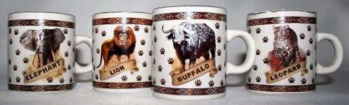 FOUR CUTE MUGS WITH PIC & DESCRIPTION ON THE BACK -  ELEPHANT, LION, BUFFALO, LEOPARD - BID PER EACH