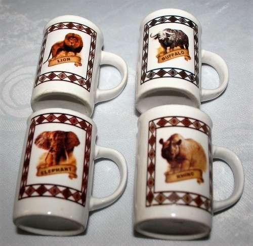 FOUR CUTE MUGS WITH PICTURES & DESCRIPTION ON BACK - * ELEPHANT, LION, BUFFALO, RHINO - BID PER EACH