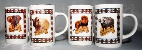 FOUR CUTE MUGS WITH PICTURES & DESCRIPTION ON BACK - * ELEPHANT, LION, BUFFALO, RHINO - BID PER EACH