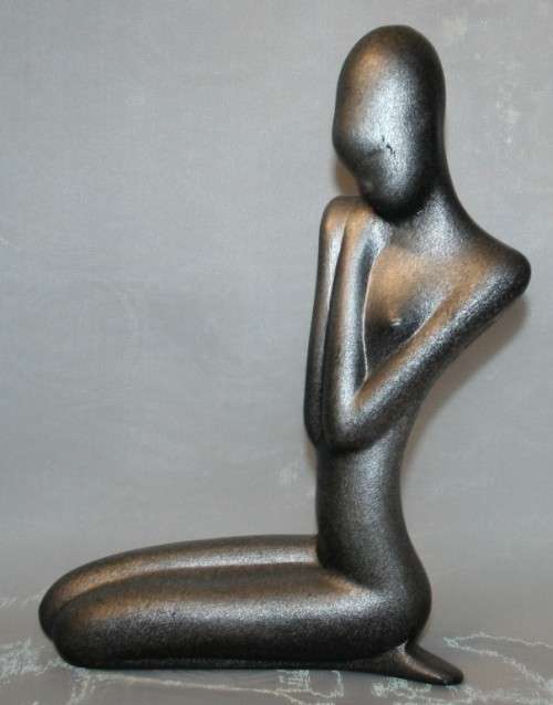 Vintage Ceramic sculpture of a nude lady silver ceramic.  This beautiful piece has a silver color