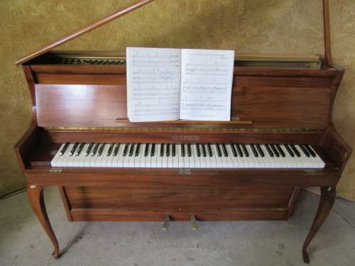 WOW WOW!!! A EXQUISITE 1958 RIPPEN PIANO IN  CONDITION ON ORIGINAL CASTERS - READY TO PLAY!!!