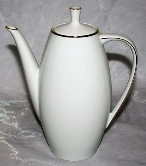 This is a lovely Tea Or Coffee Pot Vintage Porcelain by Fritz Thomas. It is spectacular with gold