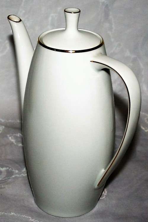 This is a lovely Tea Or Coffee Pot Vintage Porcelain by Fritz Thomas. It is spectacular with gold