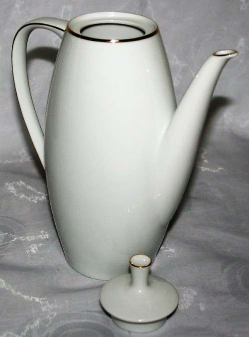 This is a lovely Tea Or Coffee Pot Vintage Porcelain by Fritz Thomas. It is spectacular with gold