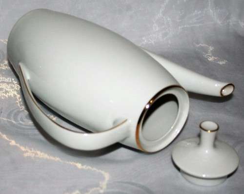 This is a lovely Tea Or Coffee Pot Vintage Porcelain by Fritz Thomas. It is spectacular with gold
