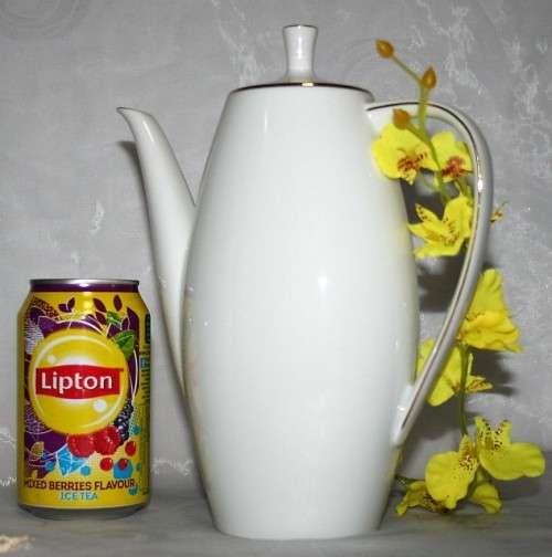 This is a lovely Tea Or Coffee Pot Vintage Porcelain by Fritz Thomas. It is spectacular with gold