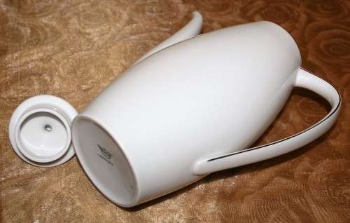 This is a lovely Tea Or Coffee Pot Vintage Porcelain by Fritz Thomas. It is spectacular with gold