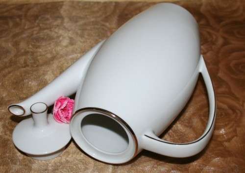 This is a lovely Tea Or Coffee Pot Vintage Porcelain by Fritz Thomas. It is spectacular with gold