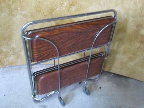 A marvelous Dinette vintage trolley table is one of the most practical serving tables,