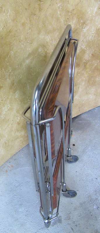 A marvelous Dinette vintage trolley table is one of the most practical serving tables,