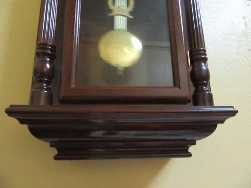 AN EXQUISITE FARAH 31 DAY WALL CLOCKS WITH THE MOST BEAUTIFUL CASE CHIME ON HOUR AND ON HALF HOUR