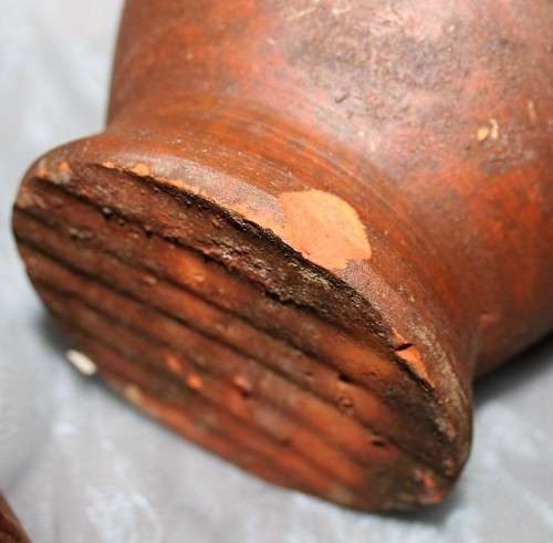 This is a beautiful antique Pottery mortar and pestle. It's handmade and hand carved - very useful