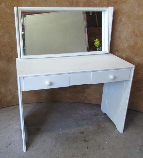 A MARVELOUS WHITE DRESSING TABLE INCLUDING A CHAIR IT IS A PERFECT MATCH BEAUTIFUL FURNITURE