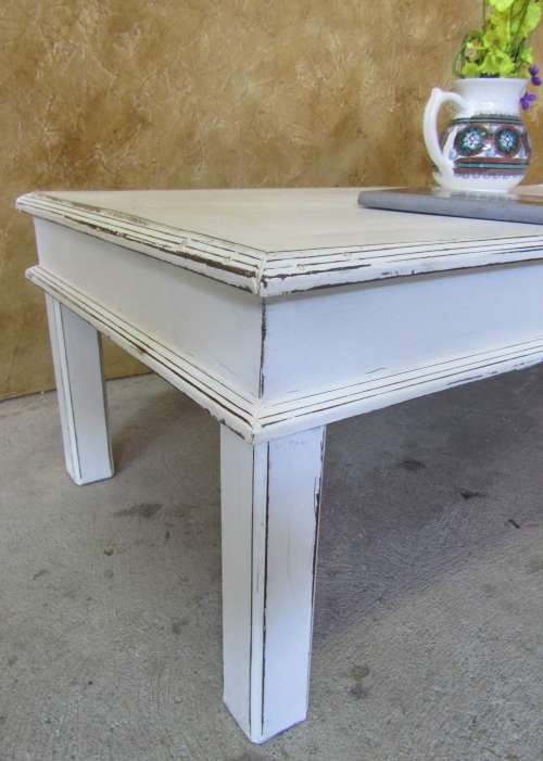 This Distressed Shabby chic table has great character. Love the large rectancular & carved edges