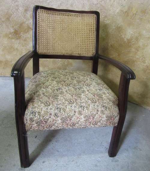 A SPECTACULAR SOLLID IMBUIA EASY CHAIR WITH RATAN/CANE BACK REST IN GOOG CONDITION