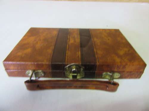 A cute Pocket Dominoes Set in a beautiful travel case 27 pieces,  good for playing whilst traveling