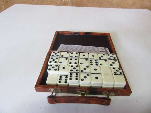 A cute Pocket Dominoes Set in a beautiful travel case 27 pieces,  good for playing whilst traveling