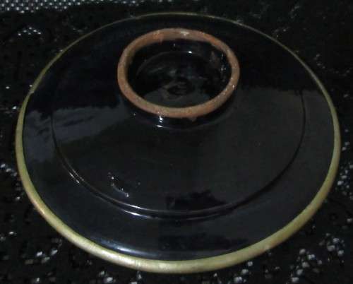 This beautiful, handmade, one-of-a-kind embossed Moroccan metal and ceramic blue plate