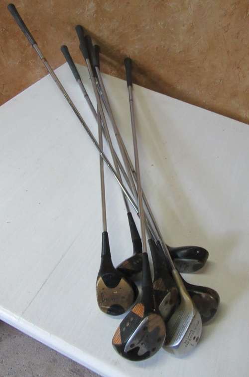 SEVEN GOLF CLUBS FOR BAR DECOR OR FOR THE KIDS TO PLAY WITH BID PER EACH