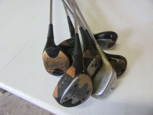 SEVEN GOLF CLUBS FOR BAR DECOR OR FOR THE KIDS TO PLAY WITH BID PER EACH