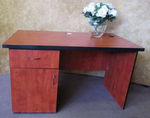 A VERY PRACTICAL AND USEABLE CHERRY WOOD FINISHED DESK - PAINT IT IN YOUR FAVORITE COLOR