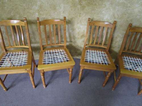 FOUR GORGEOUS COTTAGE STYLE SOLLID WOOD RIEMPIE CHAIRS IN GOOD CONDITION BID PER EACH -