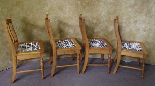FOUR GORGEOUS COTTAGE STYLE SOLLID WOOD RIEMPIE CHAIRS IN GOOD CONDITION BID PER EACH -