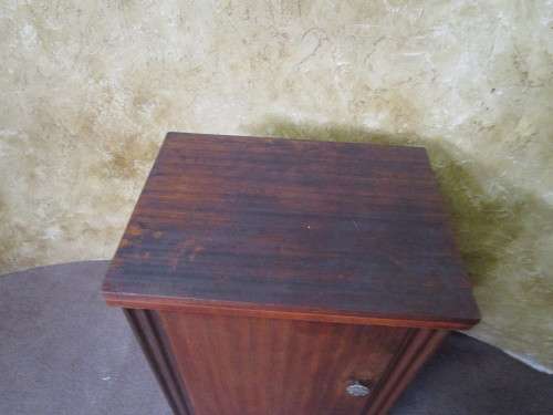 A VINTAGE BROTHER SEWING MACHINE IN A CUPBOARD IN WORKING CONDITION
