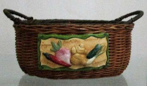 A Gorgeous Country style Oval Wicker Basket with Handles and Ceramic decorative plaque