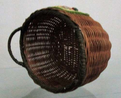 A Gorgeous Country style Oval Wicker Basket with Handles and Ceramic decorative plaque