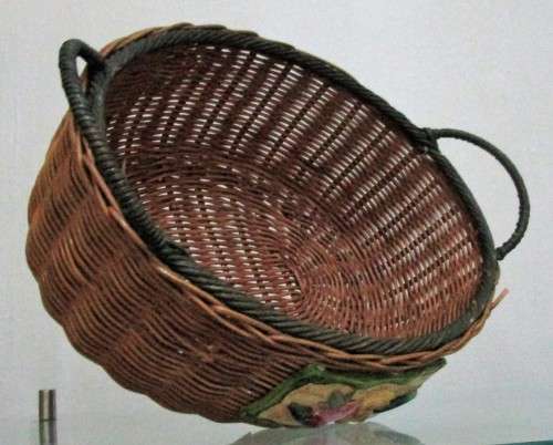 A Gorgeous Country style Oval Wicker Basket with Handles and Ceramic decorative plaque