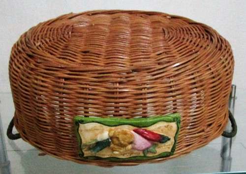 A Gorgeous Country style Oval Wicker Basket with Handles and Ceramic decorative plaque