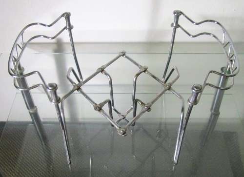 This expanding pot stand easily accommodates a range of shapes and sizes