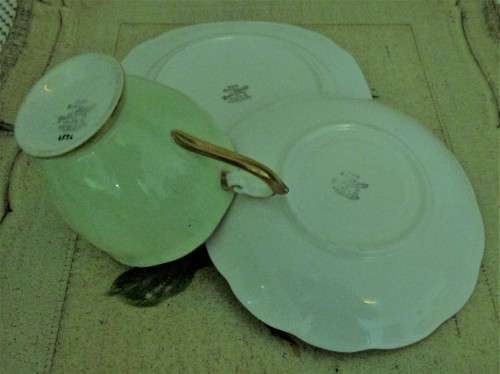 This lovely mid-century Trio Tea cup Set were made in England by Bell  China. A Beautiful Light Past