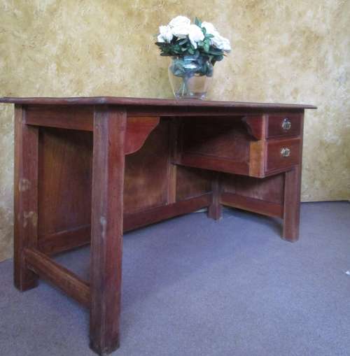 A MARVELOUS SOLLID WOOD DESK - WITH TWO DRAWERS WITH BRASS HANDLES - WILL BE FANTASTIC TO WORK