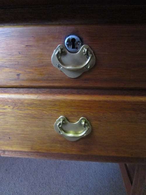 A MARVELOUS SOLLID WOOD DESK - WITH TWO DRAWERS WITH BRASS HANDLES - WILL BE FANTASTIC TO WORK