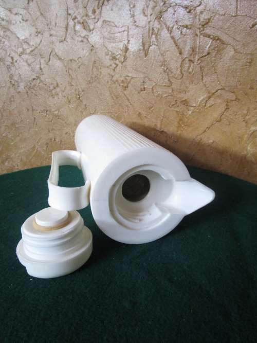 A LONG WHITE USABLE ADDIS FLASK