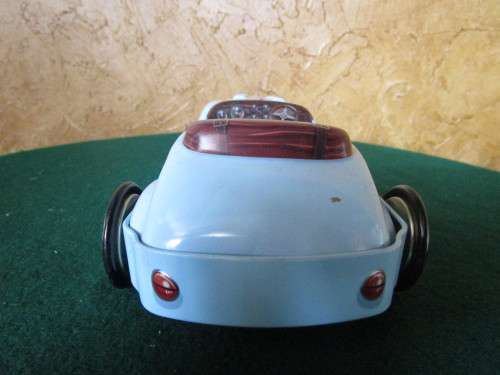 A FANTASTIC CAR SHAPED COOKIE TIN -