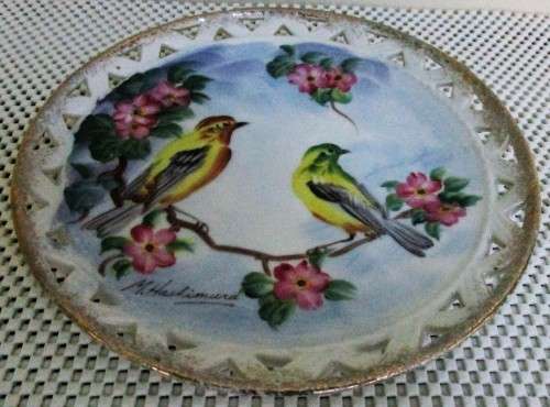 This hand painted plate features beautiful Birds painted in stunning colors signed Hashimura