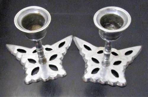 Two stunning silver metal butterfly candle holders bid per each
