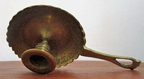 This lovely elegant brass candle holder would make a great addition to your rustic home decor.