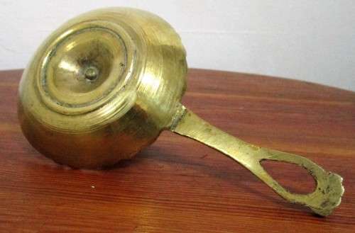 This lovely elegant brass candle holder would make a great addition to your rustic home decor.