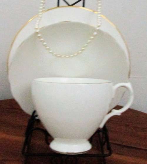A Stylish Vintage Queen Anne England Trio Set in a Crisp White with a lush Gold Trim