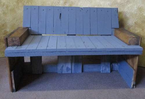A LOVELY TWO SEATER BENCH - PERFECT FOR THAT SPECIAL CORNER IN THE GARDEN